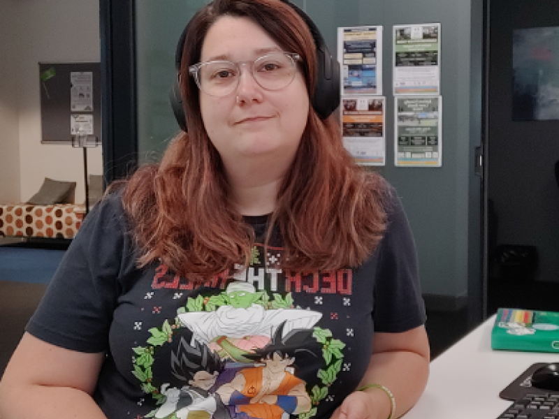 Alicia sitting at desk