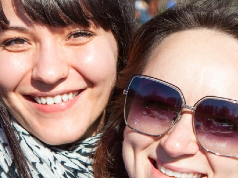 Two women smiling