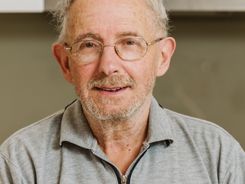 Man in kitchen looking at camera