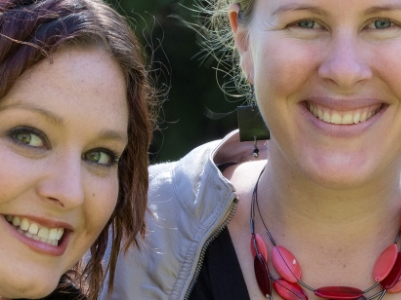 Two women smiling