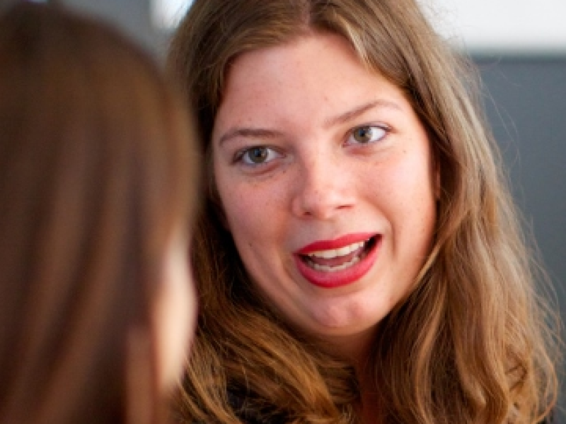 Woman talking to another woman