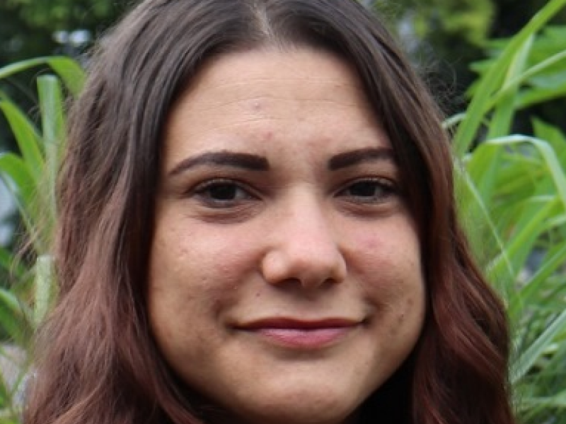 Woman in garden smiling