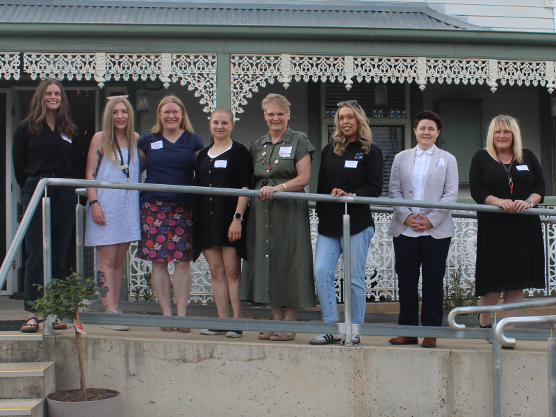 Mind Australia family and carer peer practitioners pose outside the Loddon Mallee Mental Health and Wellbeing Connect