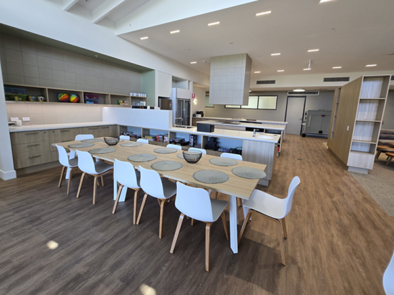 A photo of a modern kitchen table in a modern home