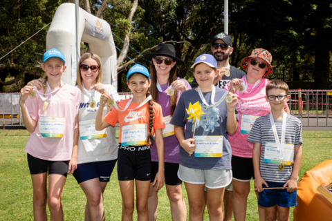 A group of young people posing at the Wellness Walk